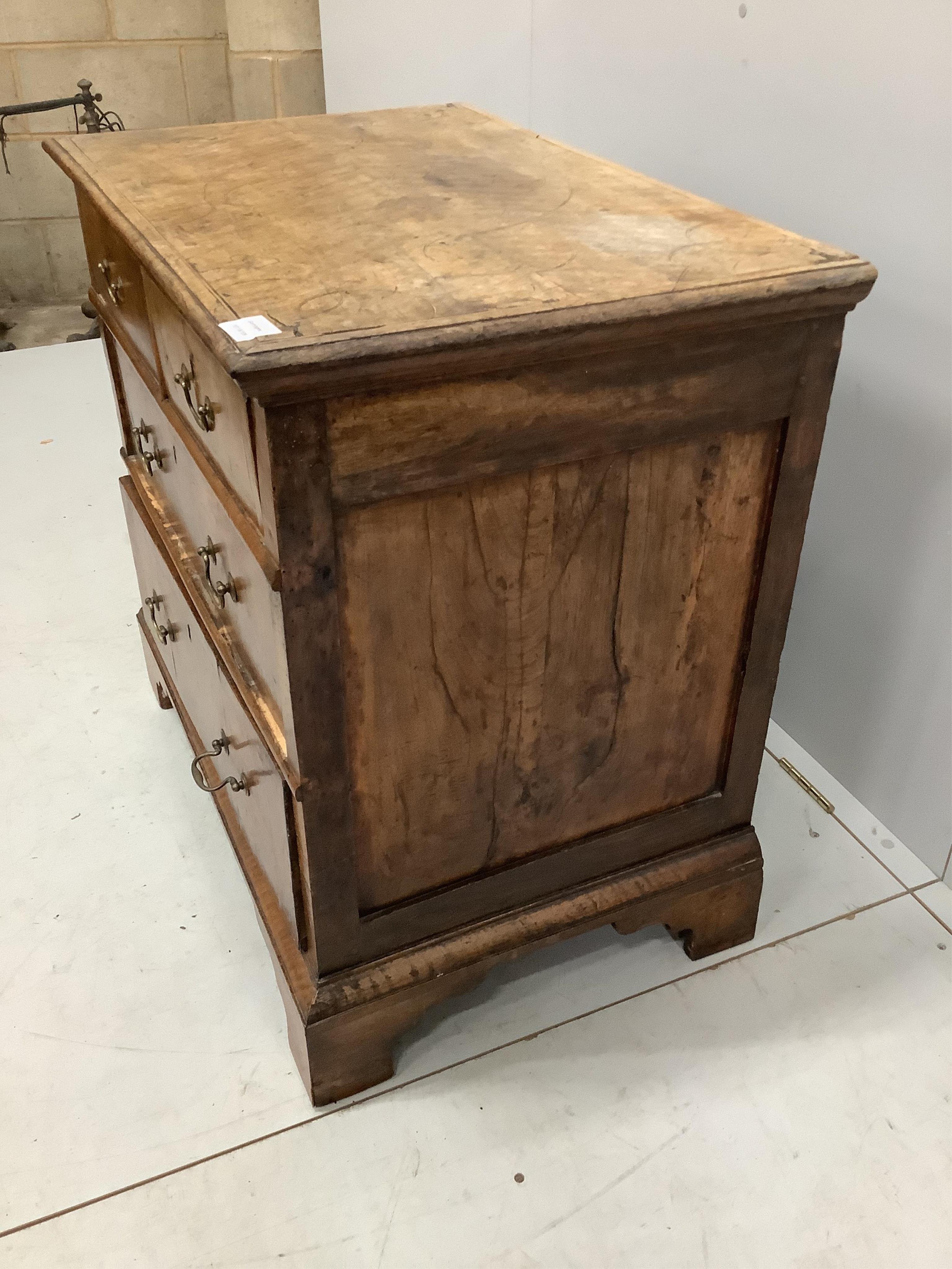 A small 18th century inlaid walnut and boxwood strung chest of drawers, alterations, width 81cm, depth 53cm, height 79cm. Condition - poor